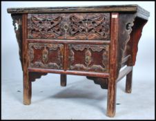 A believed late Qing dynasty / early Republic of China antique Chinese elm wood altar table chest
