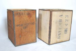 A pair of 20th century plywood and aluminium formed tea shipping storage containers / boxes.