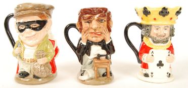A group of three Royal Doulton character Toby Jugs The Judge and Thief D6988 , Dr Jekyl and Mr