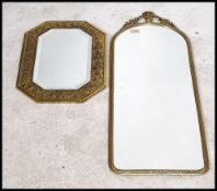 Two vintage 20th century antique style wall mirrors. One of octagonal form having a bevelled