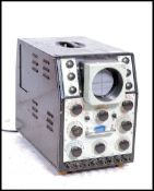 A vintage 20th century possibly military Cossor double beam Oscillograph Model 1049 MK II machine,