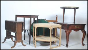A collection of 20th century vintage occasional tables dating from the turn of the 20th century to