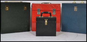 A collection of vintage and retro record storage / carry cases for both 12