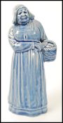 A Royal Doulton stoneware figure, 'Dutch Woman', No. H3. Leslie Harradine, circa 1912. Impressed