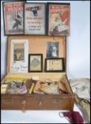 A large collection of ephemera held within a vintage suitcase to include licenses , photographs ,