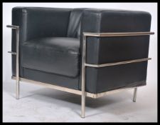 After Le Corbusier - An 'LC2 ' type black vinyl leather and chrome club chair. The armchair having a