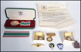 A collection of items to include a Women's Royal Voluntary Service Long Service medal together