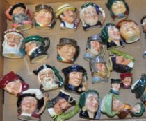 A collection of approx 30 Royal Doulton miniature Character jugs to include Robin Hood , Viking