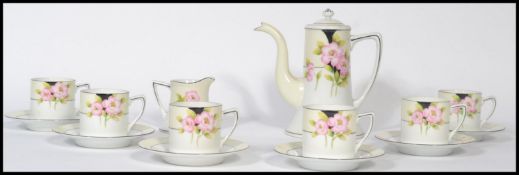 A vintage 20th century Noritake coffee service consisting of coffee pot , cups / cans , creamer