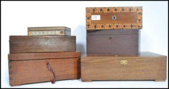 A group of vintage wooden boxes dating from the 19th century to include work boxes , jewellery