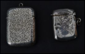 Two silver hallmarked vesta match cases. One being a 19th century Victorian example bearing