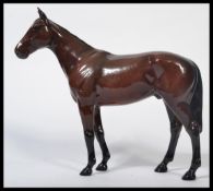 A Beswick connoisseur model Mill Reef winner of the Prix De L'arc De Triomphe 1971, matt brown.