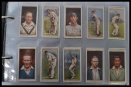 An album of vintage cigarette cards , mainly complete sets of Players , Wills , Churchman etc.