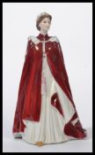 Royal Worcester Hand Painted Figurine of Queen Elizabeth II Dressed In The Robes of The Order of The