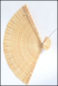 A 19th century Chinese ivory fan having 30 interna