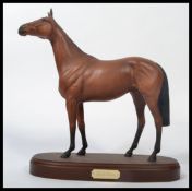 A Royal Doulton figure of Red Rum, DA 226 on stepped plinth, height 9.25