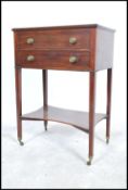 A Georgian 19th century mahogany bible box on stand table. Raised on squared legs with castors