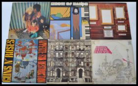 A collection of vinyl long play LP records to include Led Zeppelin Physical Graffiti, Jimi Hendrix
