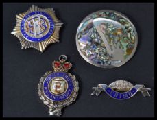 A group of three silver Masonic / RAOB medallions / clips with enamel decoration Birmingham 1921 and