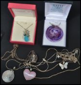 A selection of 925 silver pendant necklaces, some boxed, to include and Art Nouveau style open