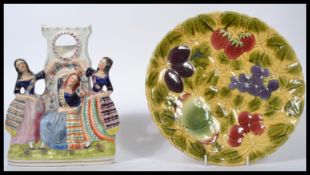 A 19th century Staffordshire flatback figure group of Queen Victoria's daughters together with a