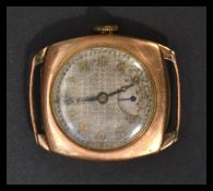 A hallmarked 9ct gold vintage 20th century watch having a silver dial with gilt numerals and faceted