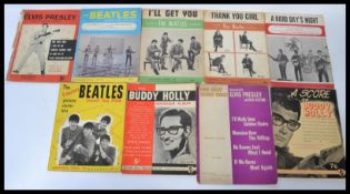 A collection of vintage 20th century popular culture sheet music to include The Beatles - I'll Get