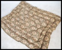 A fantastic mid 20th century eiderdown bed cover / quilt. Having a stunning paisley material cover