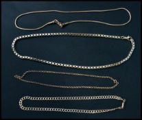 A selection of four 925 silver chain necklaces to