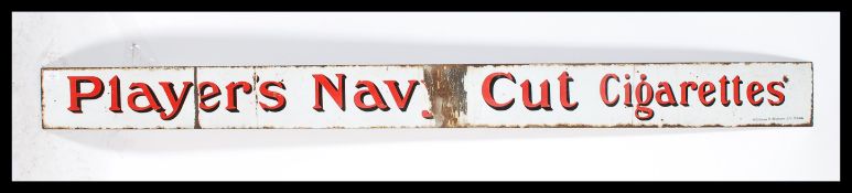An early 20th century Industrial enamel shop advertising sign for Players Navy Cut  Cigarettes being