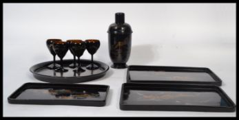 A group of vintage mid 20th century Japanese lacquer items to include a graduating set of three