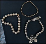 A selection of 3 925 silver bracelets having ball