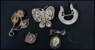 A collection of vintage 925 silver brooches to inc