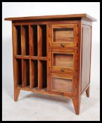 A 20th century hard wood entertainment music hi-fi unit having an arrangement  of cupboard and
