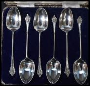 A cased set of six silver hallmarked Victorian coffee / tea spoons with finely embossed stems.