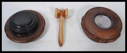 A pair of non matching vintage early 20th century Chinese hard wood carved socle bases together with