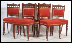 A set of 6 late Victorian mahogany dining chairs being raised on turned legs with overstuffed