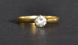 An 18ct gold single stone diamond ring of approx .3 carats. Weighs 2.6 grams. Size M.