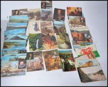 Approx 1,000 colour small size postcards in box. Some world, subjects:mostly UK