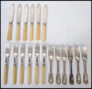 A set of vintage 20th century silver collared fish cutlery, Birmingham assay marks. Longest measures
