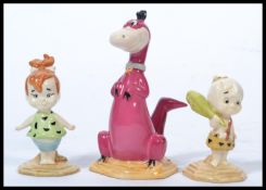 A group of three John Beswick Royal Doulton Flintstones limited edition /2000 ceramic figurines in