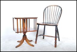 A 20th century Reprodux  by Bevan Funnell revolving bookcase /  occasional table raised on splayed