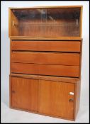 A set of 3 1970's teak wood Ladderax style modular wall units to include one with superb fitted