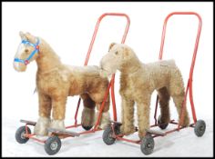 2 vintage early to mid 20th century Triang type childs push & ride along stuffed animals to