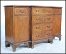 A good small proportions mahogany Regency revival break front sideboard being raised on bracket feet