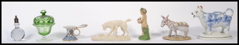 A collection 19th century ceramics to include a Staffordshire creamer in the form of a cow,