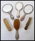 A collection of silver hallmarked dressing table items dating from the 19th century to include