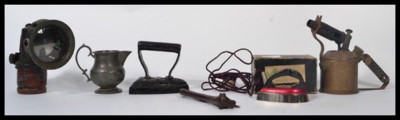 A collection of vintage 20th century items to include a large bell with turned wooden handle