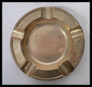 A mid 20th century silver hallmarked ashtray by Walker and Hall Sheffield bearing date marks for