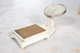 A set of mid century large ' The Bathroom No 20 ' enamel painted weighing scales with large circular